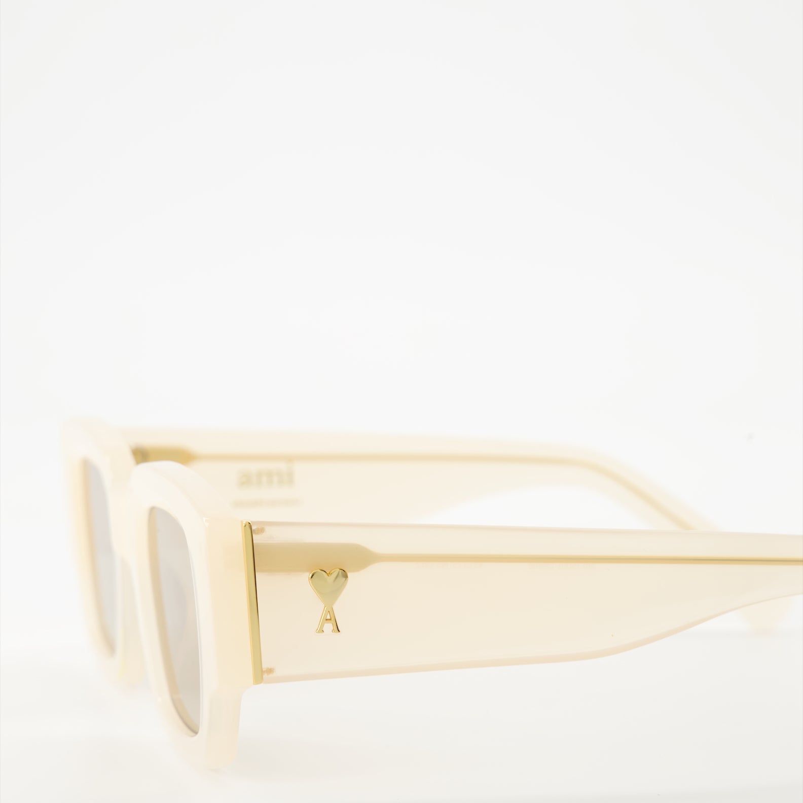 Lunettes Lunettes de soleil Ami de Coeur Ami PARIS Beige Unisexe