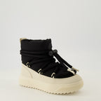 Image of the Moncler brand Altive Mid snow boots for Women - Autumn-Winter 2025 Season - Three-quarter front right view