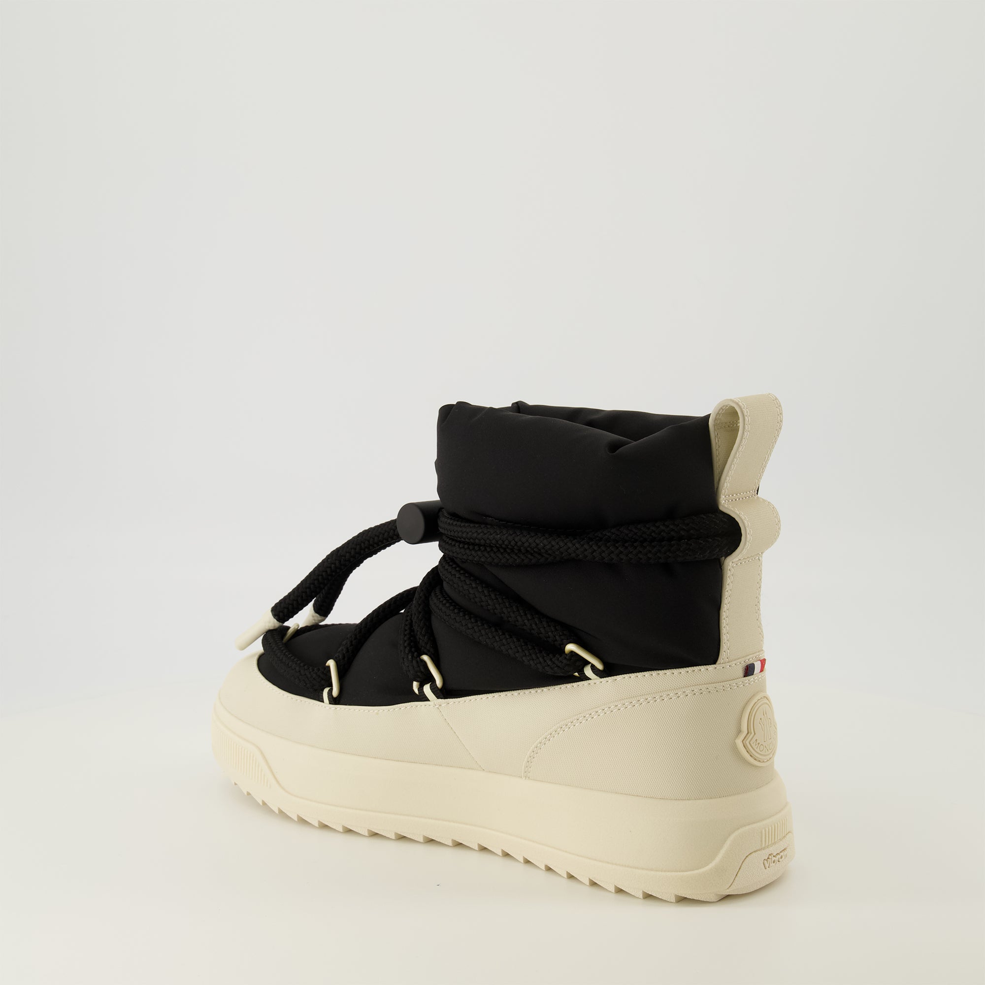 Image of the Moncler Altive Mid Snow Boots for Men - Autumn-Winter 2025 Season - Three-Quarters Front Right View