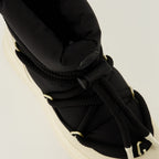 Image of the Moncler Altive Mid Snow Boots for Men - Autumn-Winter 2025 Season - Top View of the Pair of Shoes