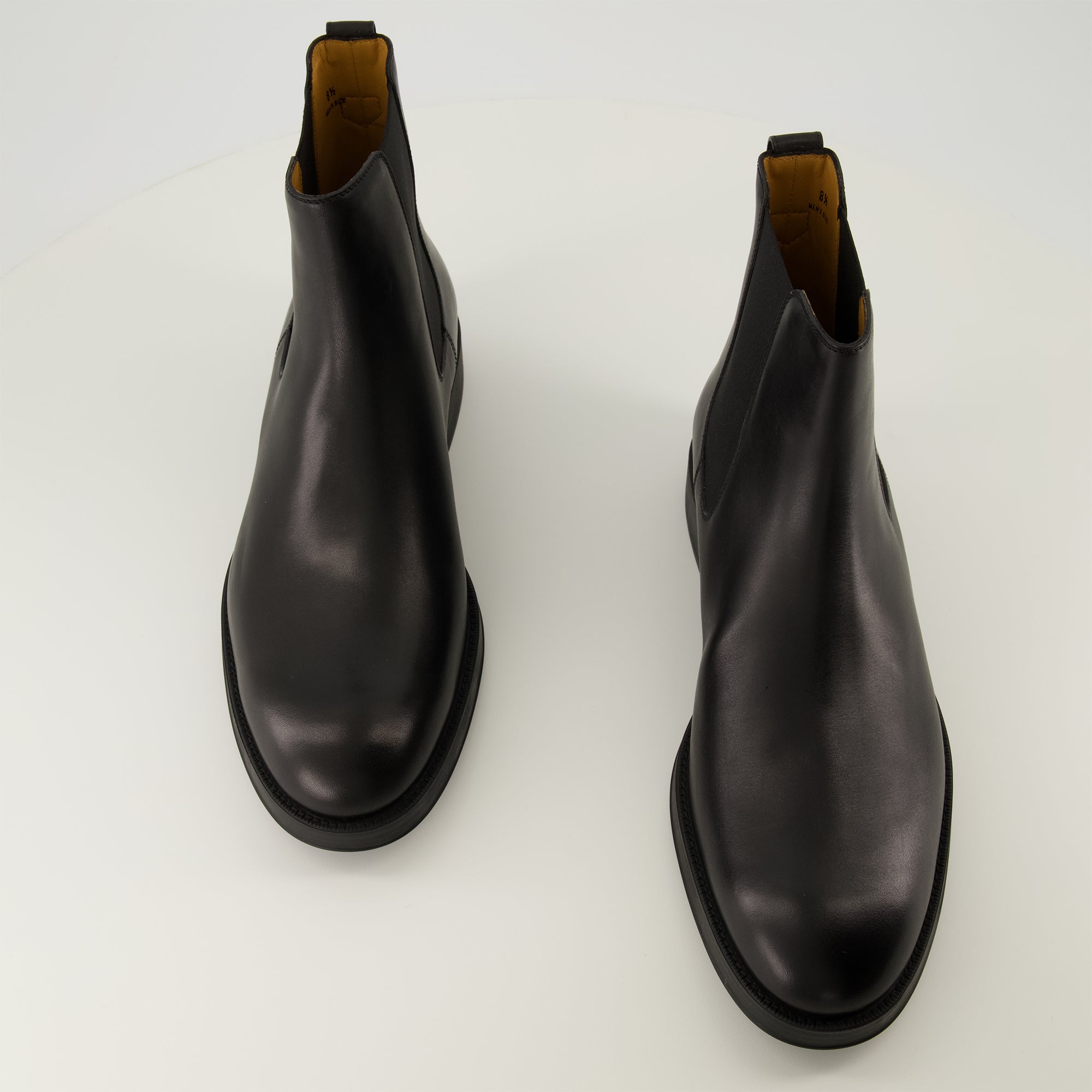 Image de l'article Bottines en cuir de la marque Tod's pour Homme - Saison Automne-Hiver 2025 - Vue de dessus paire de chaussure