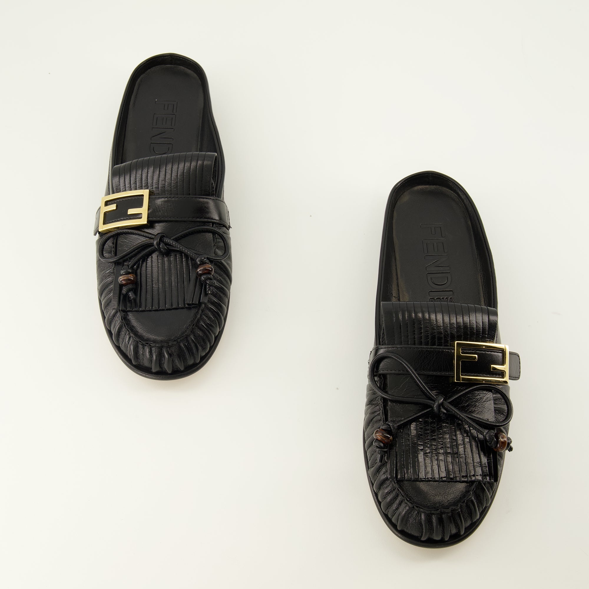 Chaussures ouvertes Schwarze Leder Baguette Mules Fendi Noir Femme