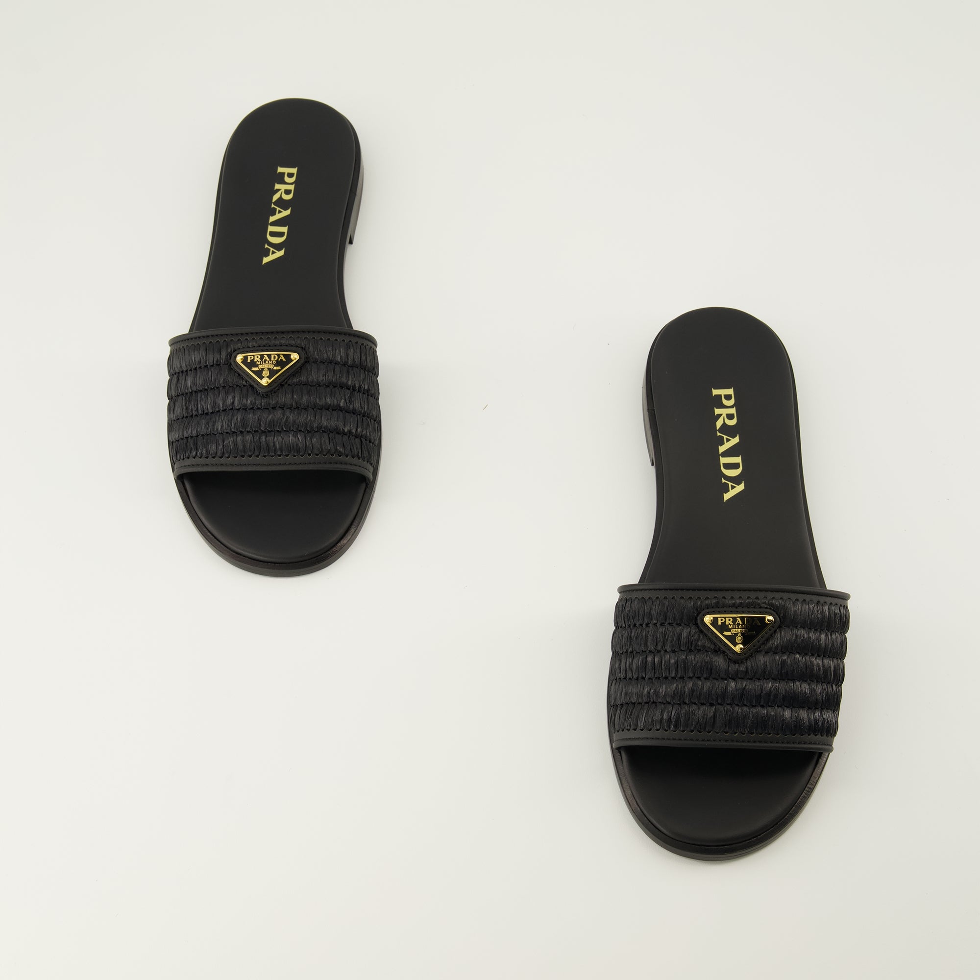 Image de l'article Mules en crochet noir de la marque Prada pour Femme - Saison Printemps-Été 2026 - Vue de dessus paire de chaussure