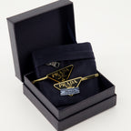 Chapeaux, casquettes et bonnets Épingles à cheveux Triangle Prada Noir Femme