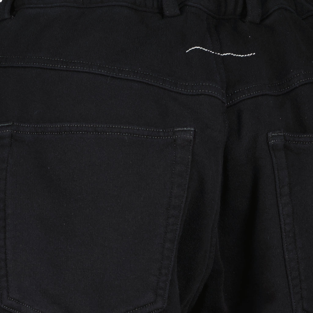 Imagen del pantalón vaquero negro de pierna ancha de la marca Mm6 para Mujer - Temporada Primavera-Verano 2026 - Vista Detallada_1