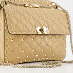 Handtaschen und schultertaschen Sac Spike en cuir Valentino Garavani Beige Femme