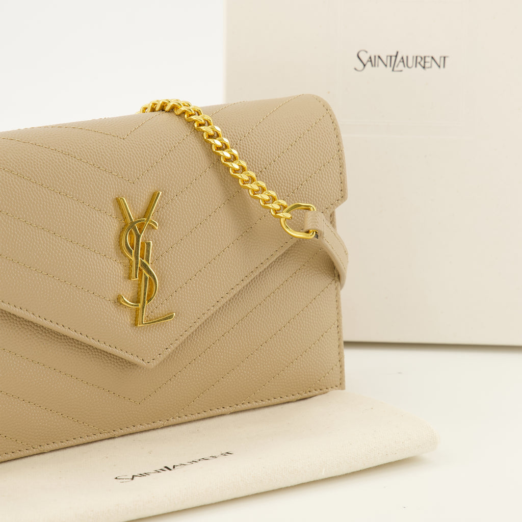 Sacs à main et épaule Portafoglio Cassandre con Catena in Pelle Grana Beige Saint Laurent Beige Femme
