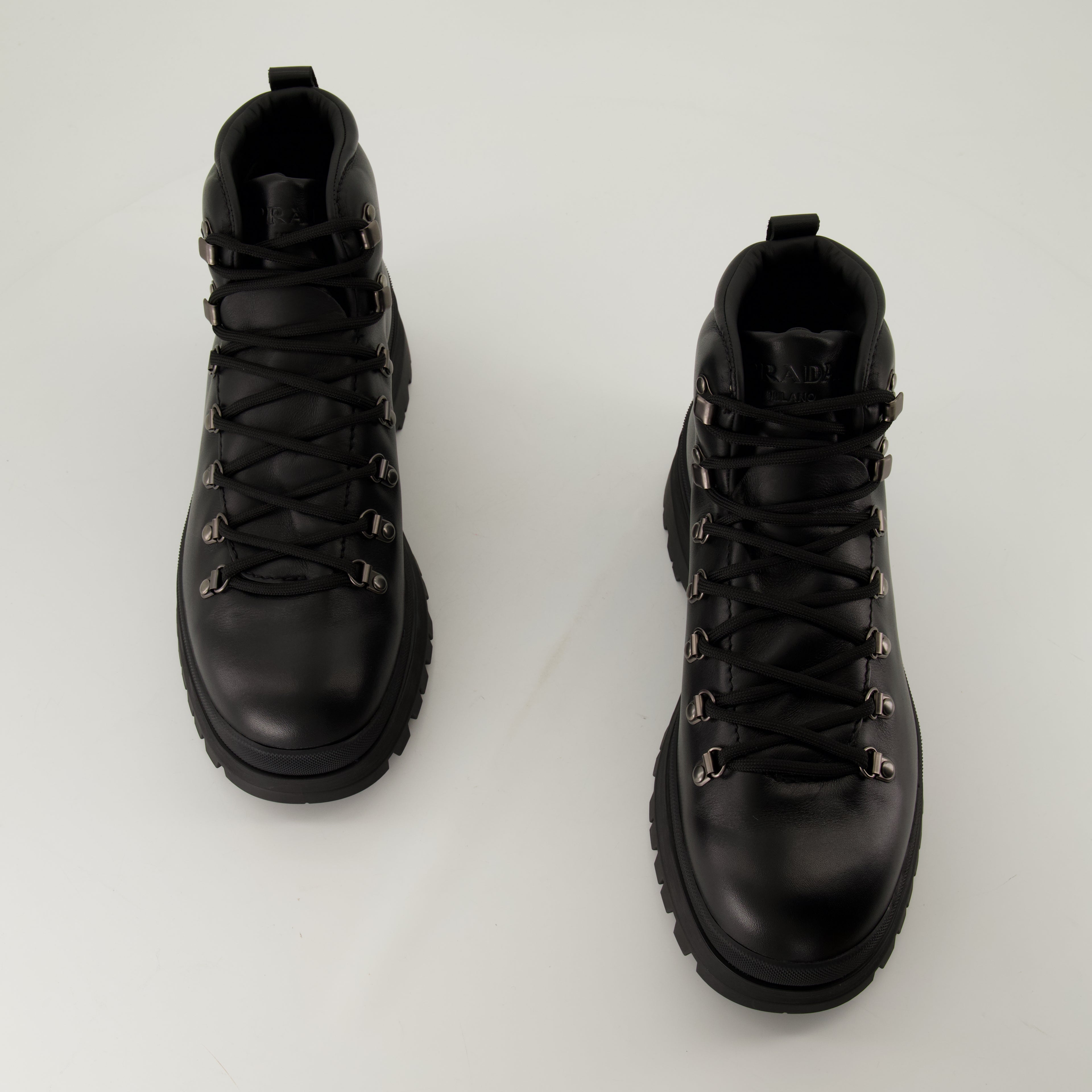 Boots and ankle boots Brixen Ankle Boots Prada Black Homme