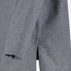 Immagine dell'articolo Camicia polo grigia in lana del marchio Ami PARIS per Unisex - Stagione Autunno-Inverno 2025 - Vista Dettagliata_2
