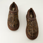 Imagen de las Mules Tazz Caspian de la marca Ugg para Mujer - Temporada Otoño-Invierno 2025 - Vista de cima do par de sapatos