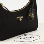 Immagine della Mini borsa Re-Edition 2005 nera del marchio Prada per donna - Collezione Primavera-Estate 2026 - Vista Dettagliata_2