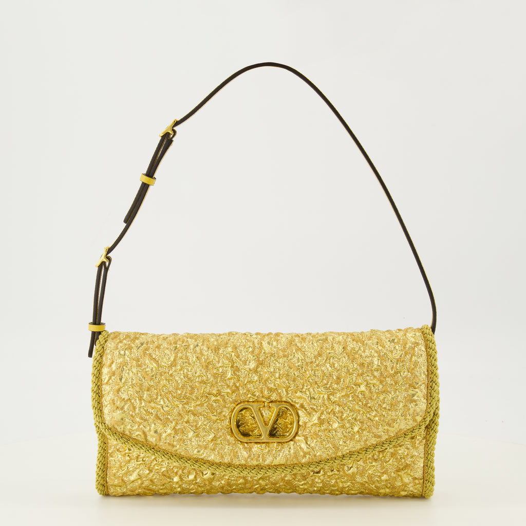 Image de l'article Petit sac DeVain en jacquard doré de la marque Valentino Garavani pour Femme - Saison Printemps-Été 2026 - Vue de Face