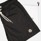 Imagem do Short de Banho Monograma da marca Moncler para Homem - Temporada Primavera-Verão 2025 - Vista Detalhada_1
