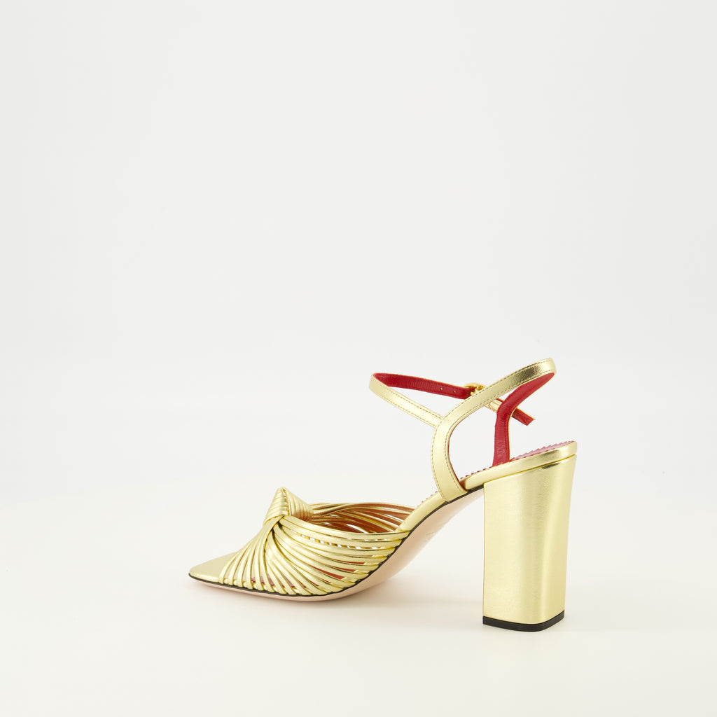 Image of the Annet heeled sandals in gold lamé by Valentino Garavani for Women - Spring-Summer 2026 - Three-quarter back right view