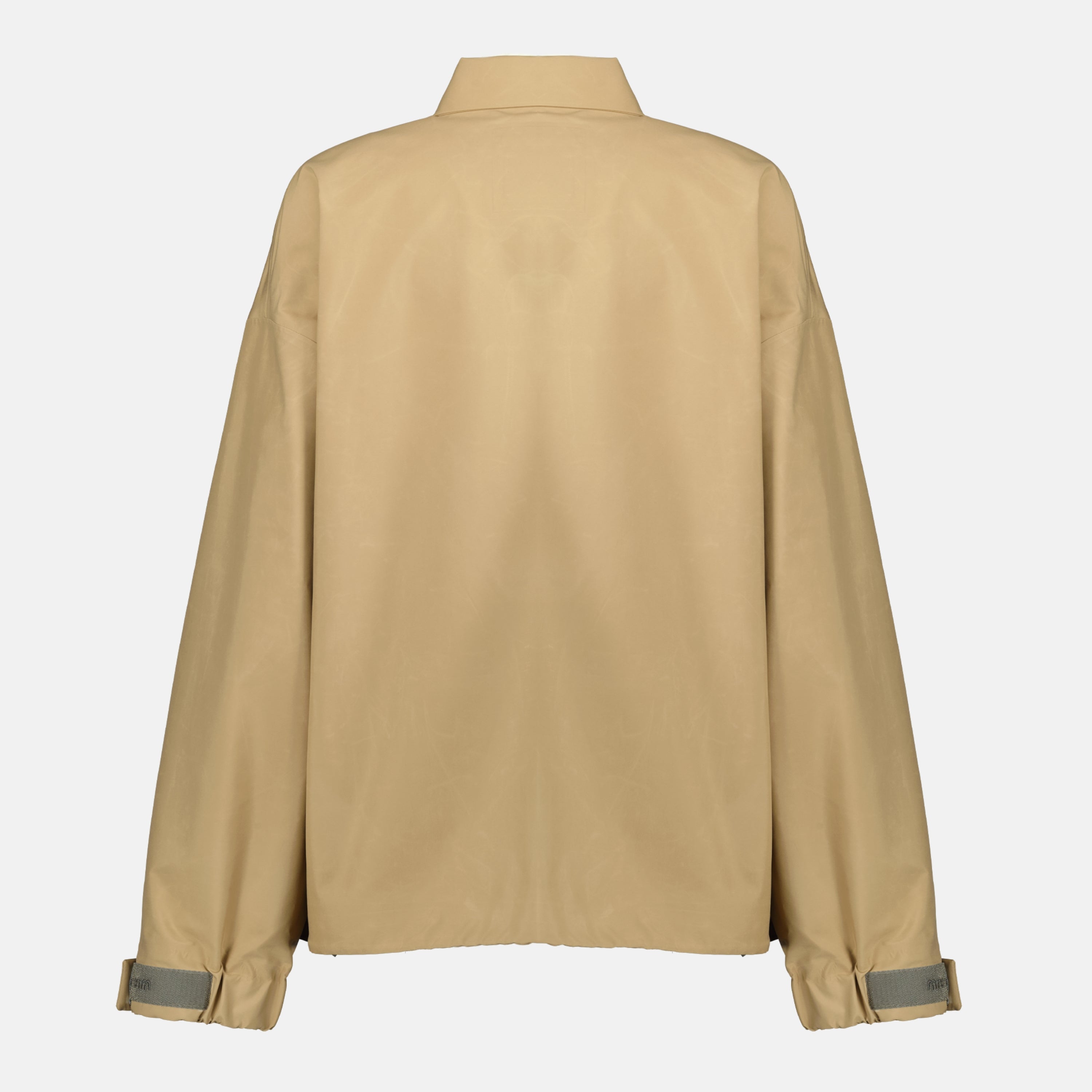 Imagem do corta-vento bege da marca Miu Miu para Mulheres - Temporada Primavera-Verão 2026 - Vista Traseira