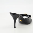 Chaussures ouvertes Mules à talon Bow Versace Noir Femme