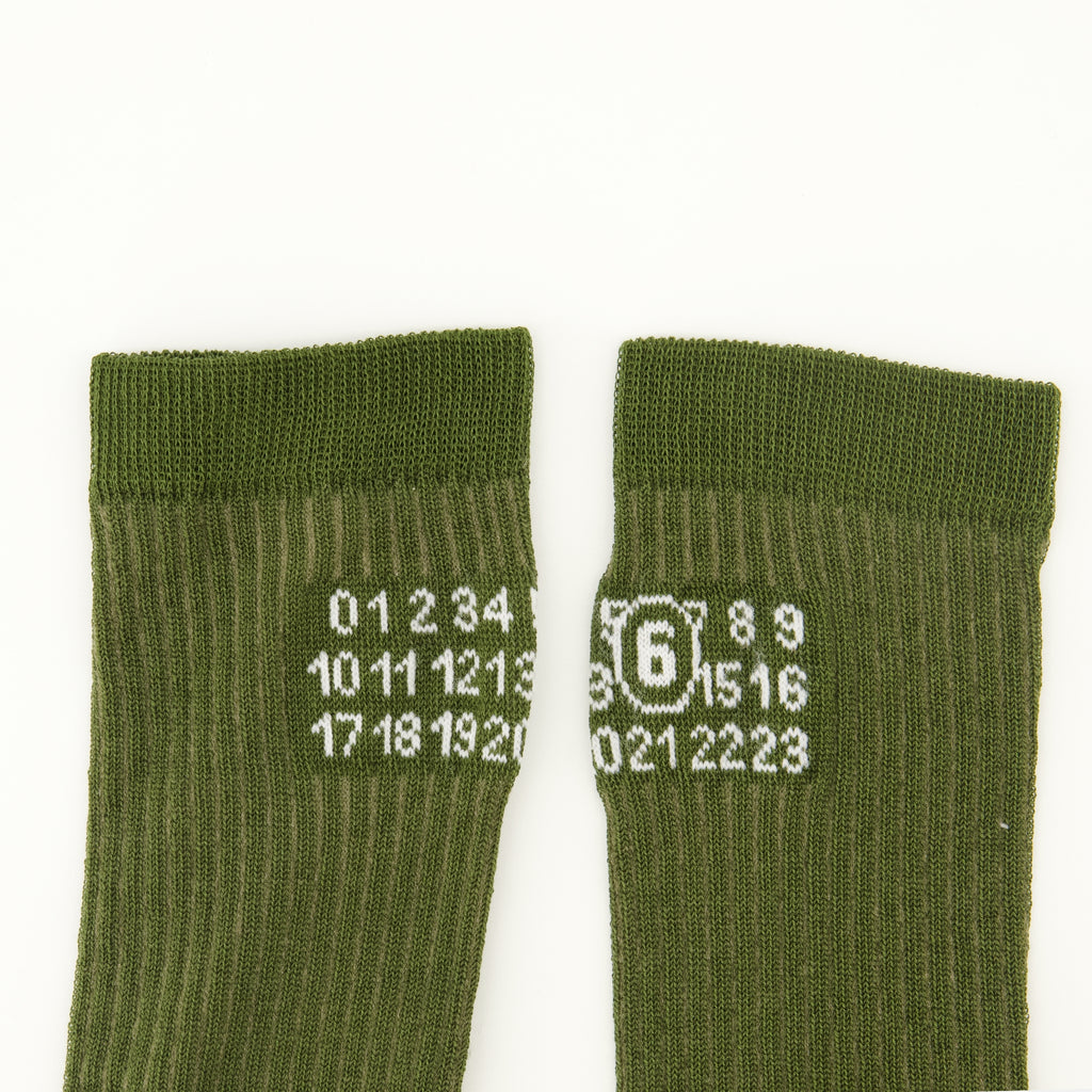 Image de l'article Chaussetes Numeric kaki de la marque Mm6 pour Femme - Saison Printemps-Été 2026 - Vue détaillée_2
