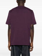 Image de l'article T-shirt à logo en cuir de la marque Moncler pour Homme - Saison Automne-Hiver 2025 - Vue détaillée_1