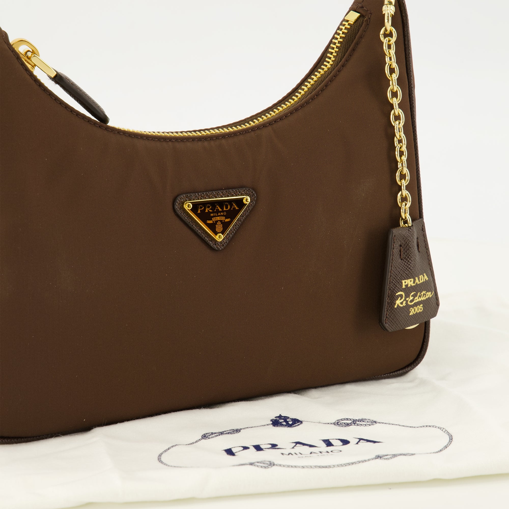 Sacs à main et épaule Bolso Mini Re-Edition 2005 en Re-Nylon Marrón Prada Marron Femme