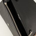 Sacs à main et épaule Portafoglio Cassandre con Catena in Pelle Grana Nera Saint Laurent Noir Femme