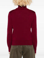 Imagen del suéter de cuello alto Ami de coeur de la marca Ami PARIS para Mujer - Temporada Otoño-Invierno 2025 - Vista Detallada_4