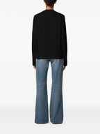 Image of the long-sleeve T-shirt Heart Friend by the brand Ami PARIS for Unisex - Autumn-Winter 2025 - Detailed View_1