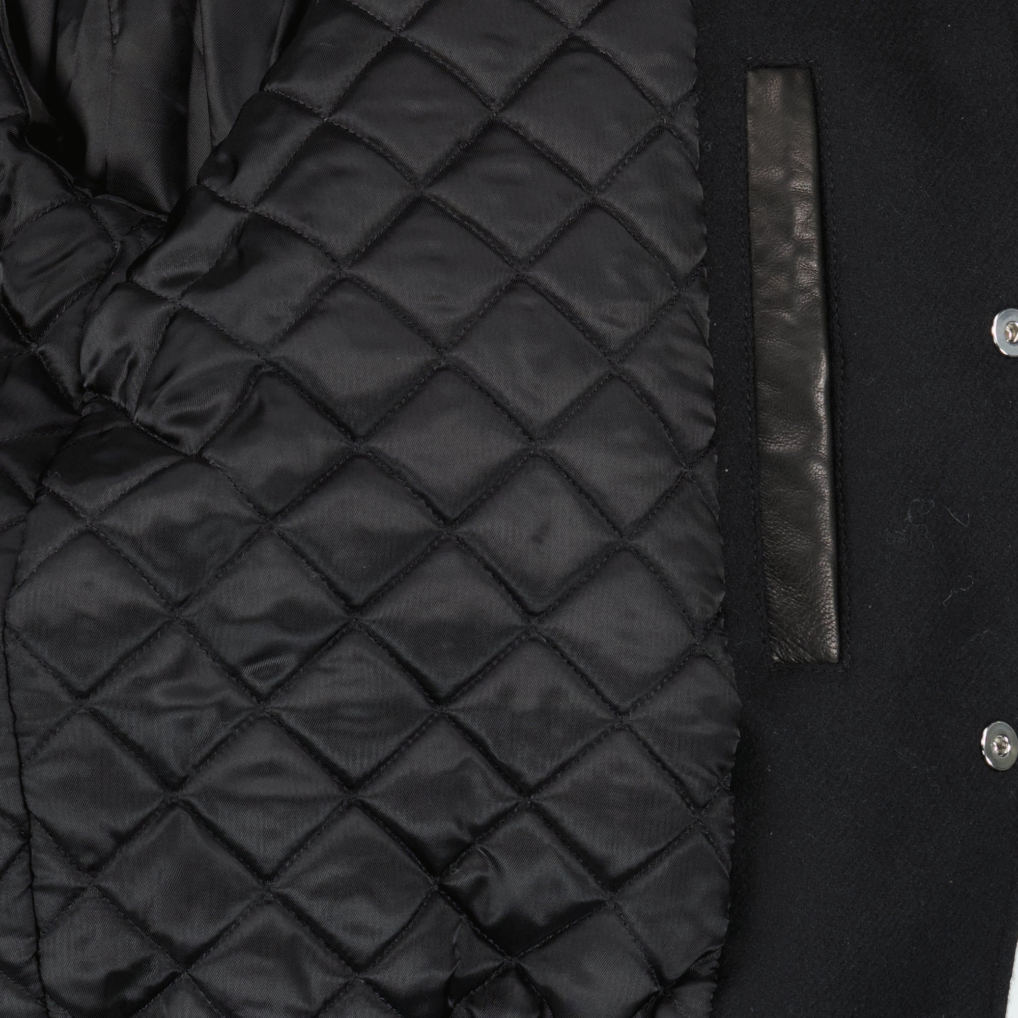 Image of the black two-tone bomber jacket by Givenchy for men - Spring-Summer 2026 - Detailed view 2