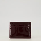Image of the Burgundy patent leather cardholder by Saint Laurent for Women - Spring-Summer 2026 - Back View