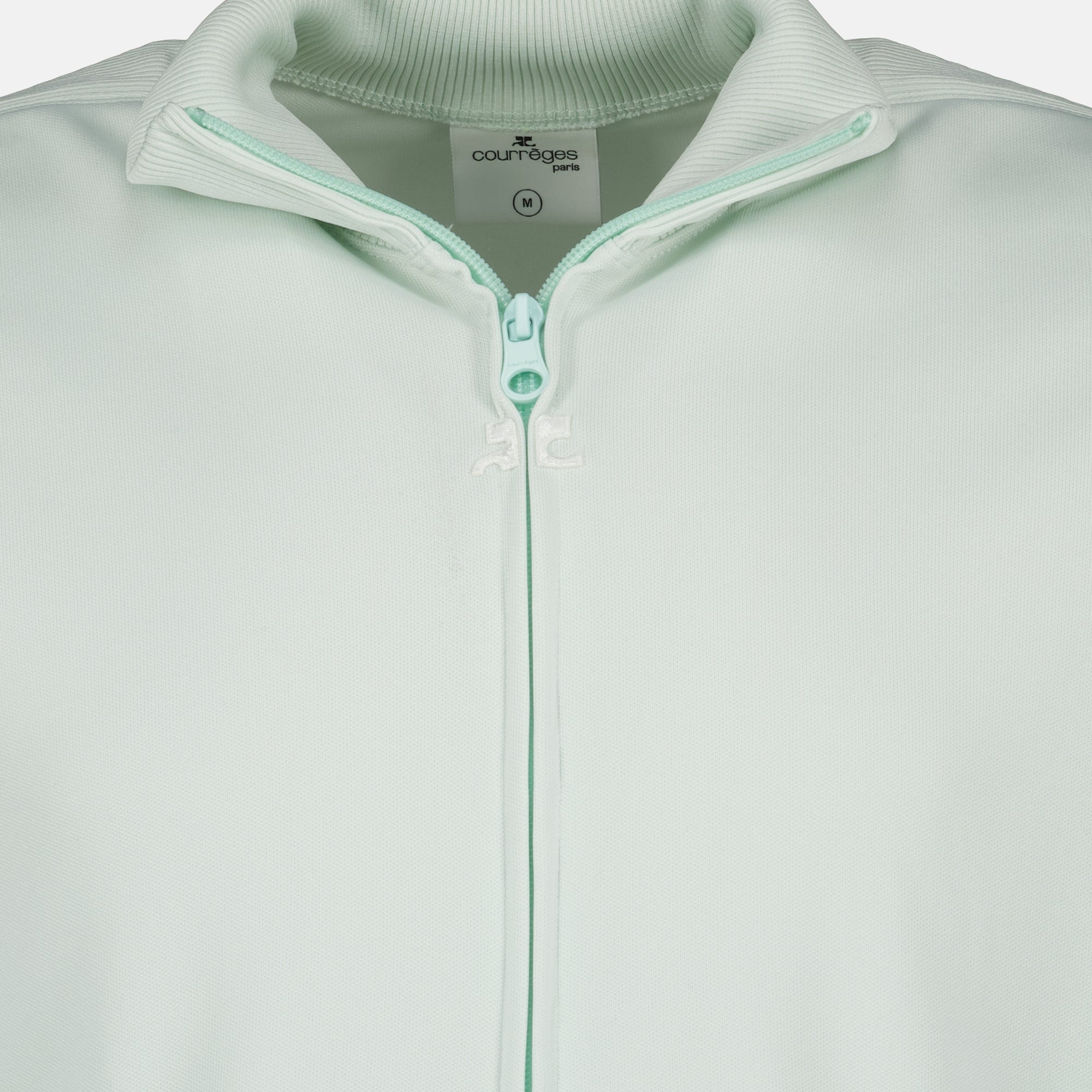 Imagem da jaqueta de fato de treino azul da marca Courrèges para Homem - Temporada Primavera-Verão 2026 - Vista Detalhada 1