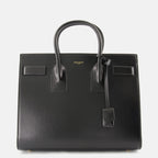 Sacs à main et épaule Kleine Schwarze Leder-Handtasche Saint Laurent Noir Femme