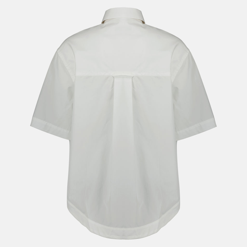 Imagem da camisa branca de algodão com coração AMI da marca Ami PARIS para Unisex - Temporada Primavera-Verão 2026 - Vista Traseira