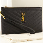 Pochettes Cassandre Leather Clutch in Black Saint Laurent Noir Femme