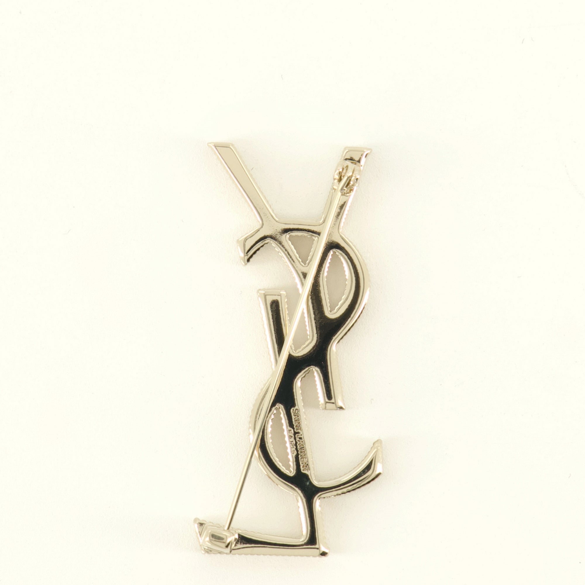Bijoux Broche Cassandre en métal doré Saint Laurent Doré Unisexe