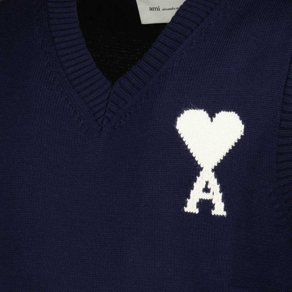 Image of the AMI sleeveless sweater with navy blue heart from the brand Ami PARIS for Unisex - Spring-Summer 2026 - Detailed View_1