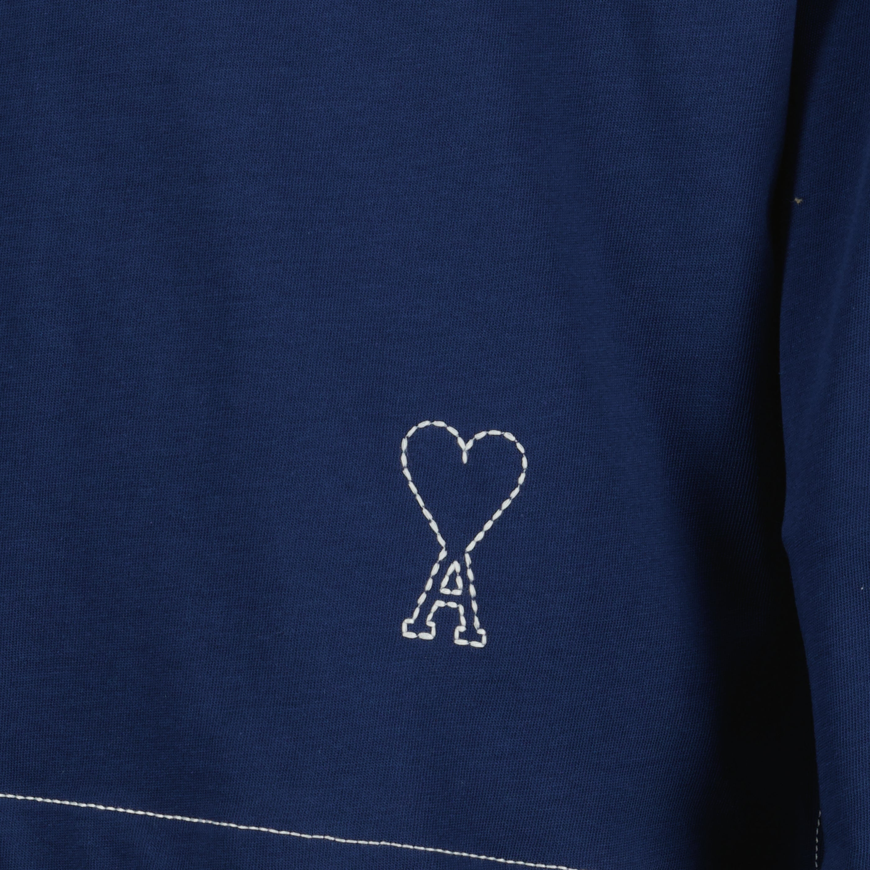 Image de l'article Polo à manches longues bleu marine en coton de la marque Ami PARIS pour Homme - Saison Printemps-Été 2026 - Vue détaillée_1