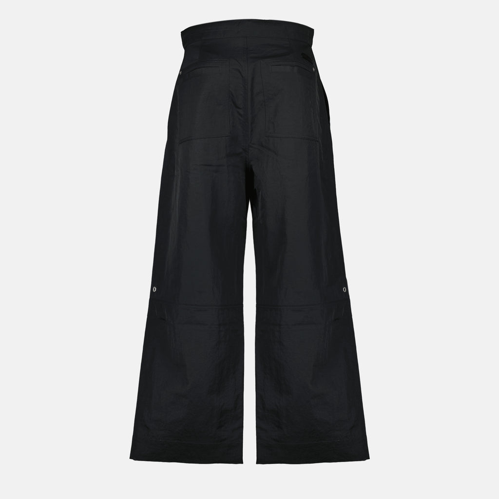 Image of the Ami PARIS brand zippered pants for men - Fall-Winter 2025 - Back view