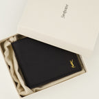 Image de l'article Portefeuilles Tiny Cassandre noir doré de la marque Saint Laurent pour Homme - Saison Printemps-Été 2026 - Vue détaillée_3