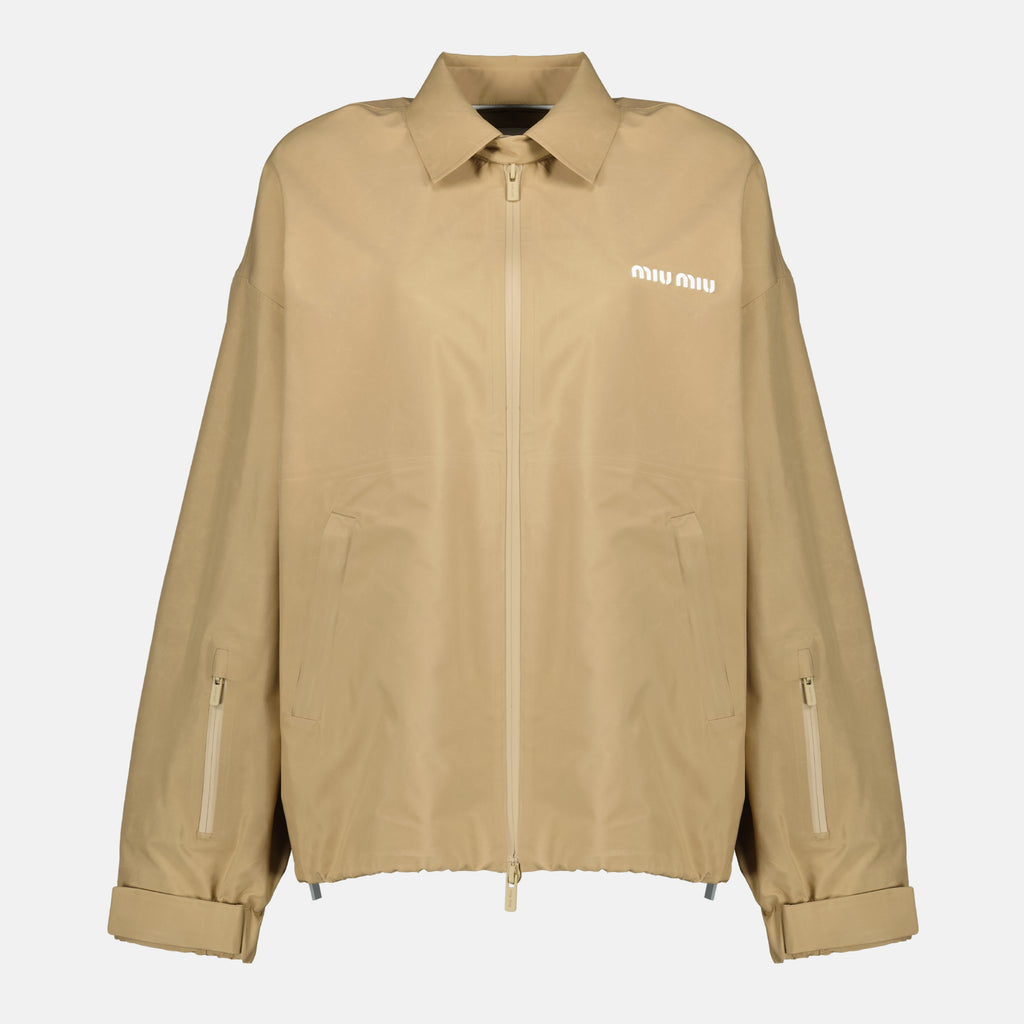 Imagem do corta-vento bege da marca Miu Miu para Mulheres - Temporada Primavera-Verão 2026 - Vista Frontal