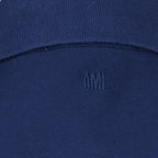 Immagine del Polo AMI di cuore tessuto blu beige del marchio Ami PARIS per Unisex - Stagione Primavera-Estate 2026 - Vista Dettagliata_2