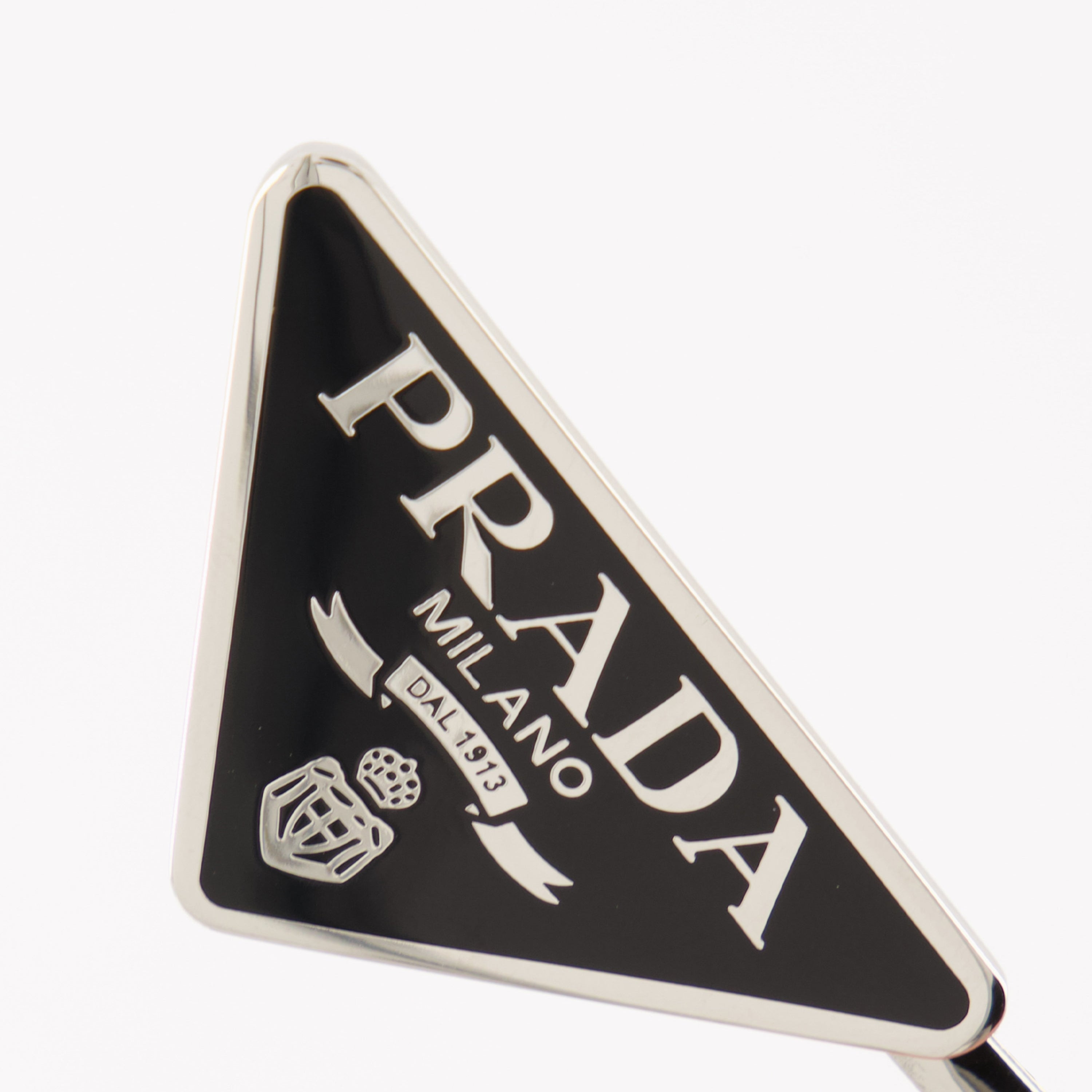 Image of the black hair clips by Prada for Women - Spring-Summer 2026 - Detailed View
