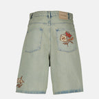 Bild der Short Dusty mit gestickten Blumen aus blauem Denim von Drole De Monsieur für Herren - Frühjahr-Sommer 2026 - Rückansicht