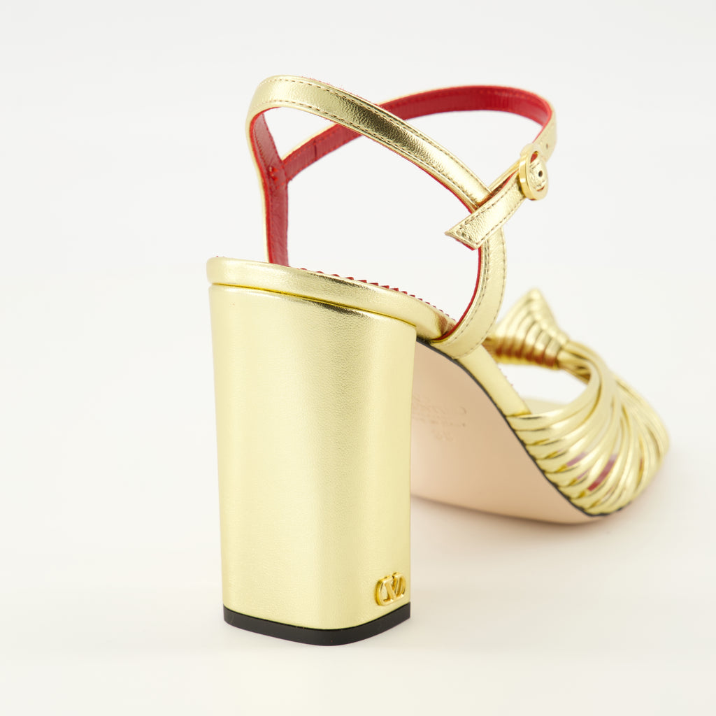 Image of the Annet heeled sandals in gold lamé by Valentino Garavani for Women - Spring-Summer 2026 - Back view