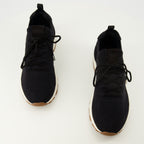 Immagine delle sneakers B80 nere da uomo di Dior - Collezione Autunno-Inverno 2025 - Vista dall'alto del paio di scarpe
