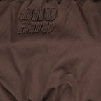 Imagem do Fão Marrão em Jersey da marca Miu Miu para Mulheres - Temporada Primavera-Verão 2026 - Vista Detalhada 1