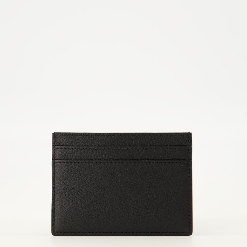 Image de l'article Portes-cartes Tiny Cassandre en cuir noir de la marque Saint Laurent pour Homme - Saison Printemps-Été 2026 - Vue de Dos