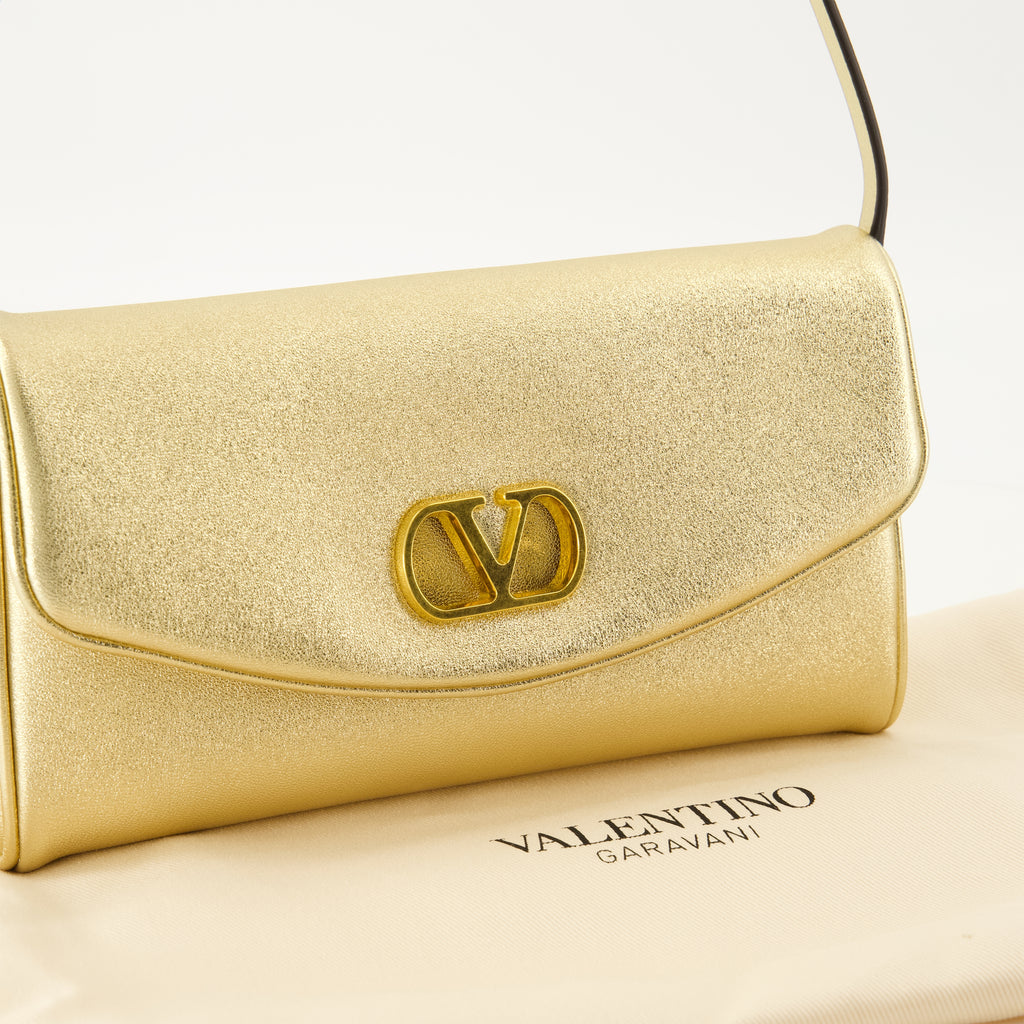 Sacs à main et épaule DeVain Bag aus goldfarbenem Lamé-Nappa-Leder Valentino Garavani Doré Femme