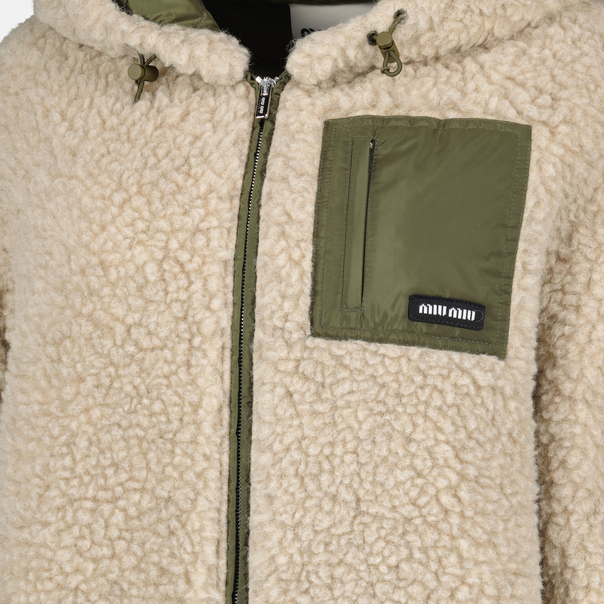 Image of the Miu Miu Women's Teddy Puffer Jacket - Spring-Summer 2026 - Detailed View_1
