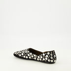 Imagen de las ballerinas Jane de ante negro de la marca Khaite para mujer - Temporada Primavera-Verano 2026 - Vista tres cuartos trasera derecha