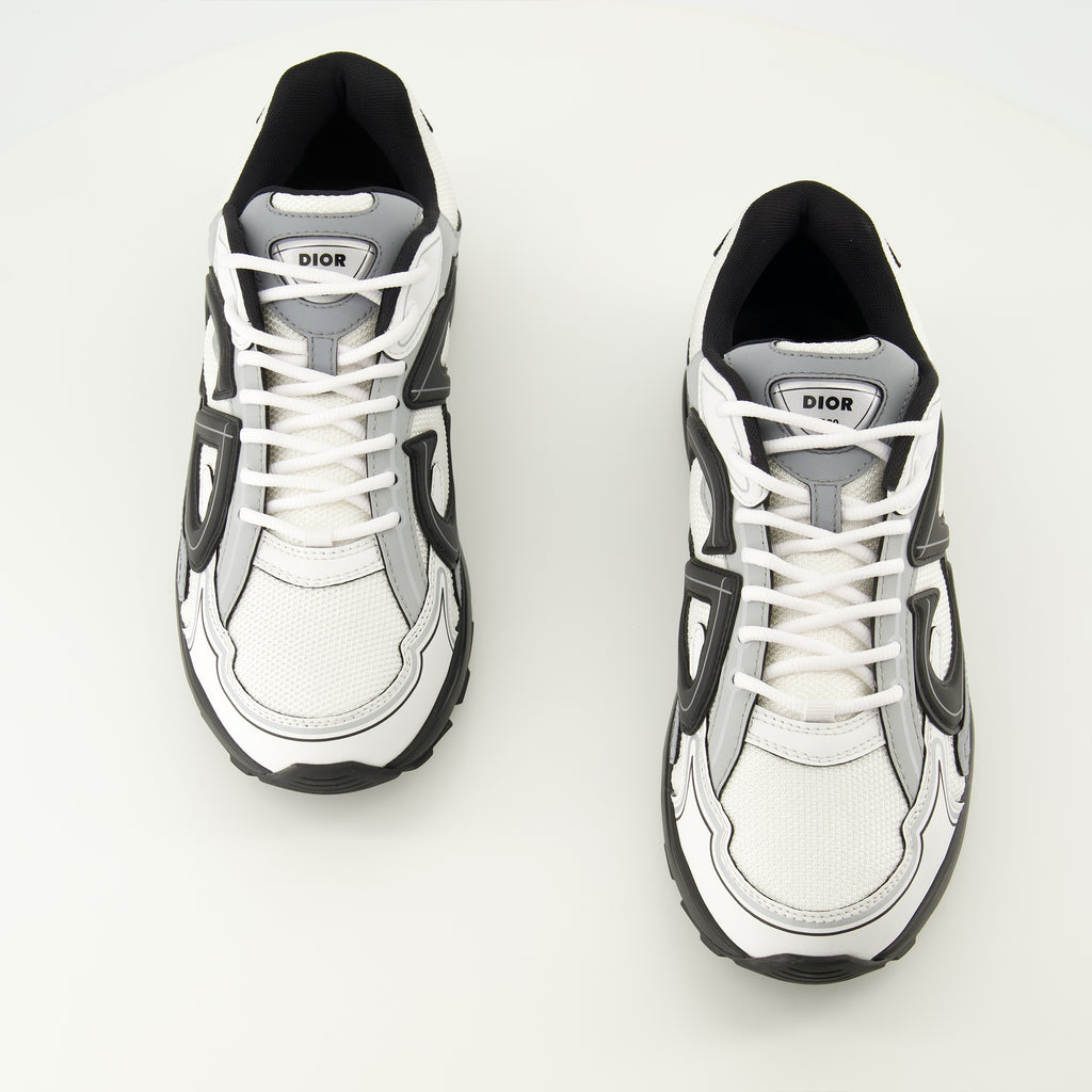 Bild der grauen Dior Herren B30 Sneakers - Frühjahr-Sommer 2026 - Draufsicht auf das Paar Schuhe