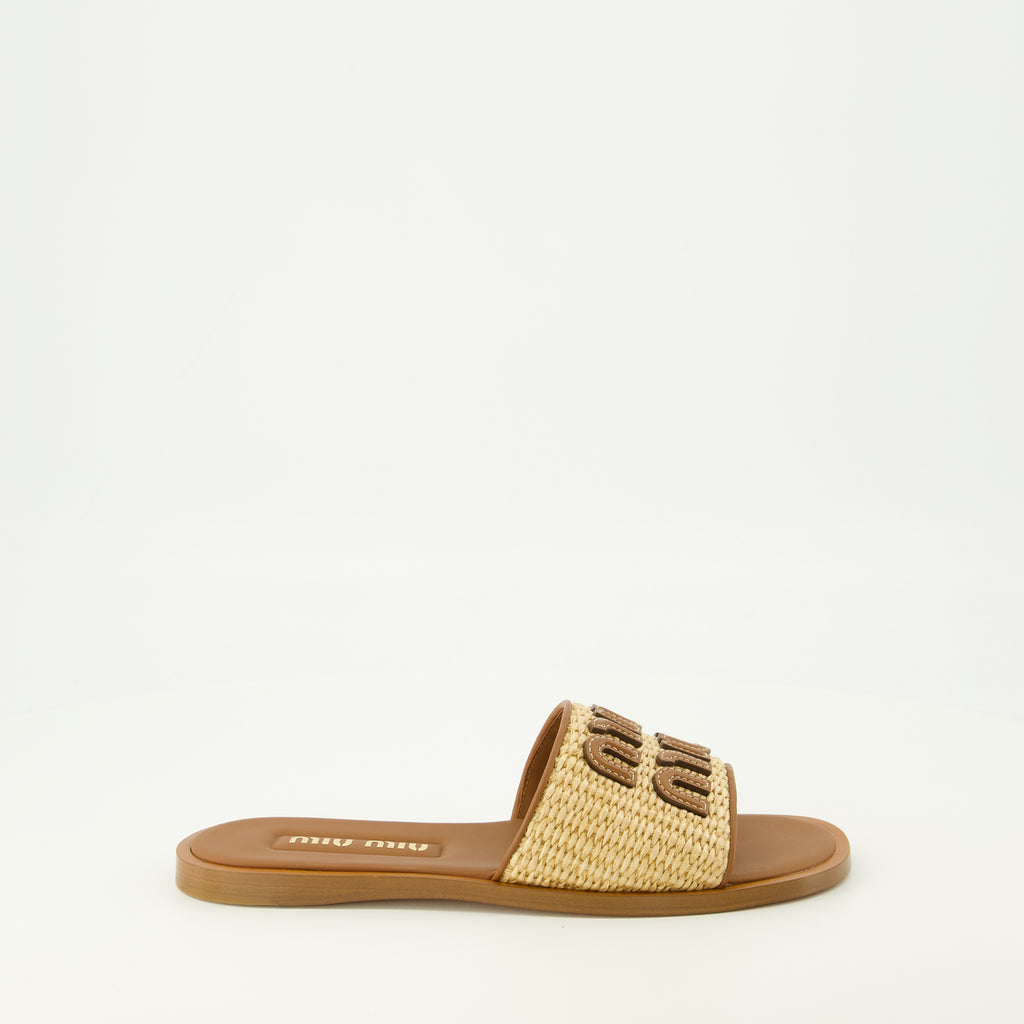 Image of the brown leather and raffia slipper from the Miu Miu brand for Women - Spring-Summer 2026 Season - Right side view